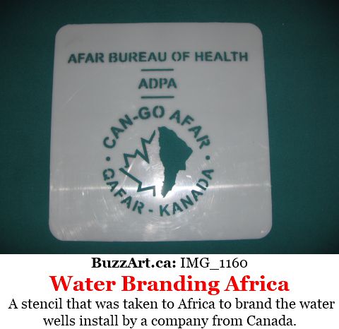 A stencil that was taken to Africa to brand the water wells install by a company from Canada.